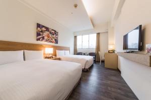 Phòng Hai Giường Đơn Loại Sang (Deluxe Twin Room)