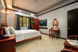 Phòng Giường Đôi Nhìn Ra Vườn (Double Room with Garden View)