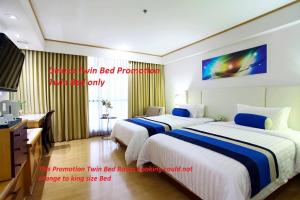 Phòng Hai Giường Đơn Loại Sang (Deluxe Twin Room)