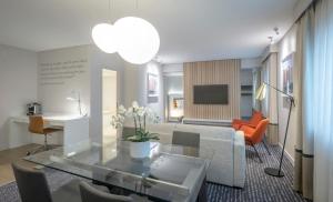 One-Bedroom King Suite with River View room in The Morrison Dublin Curio Collection by Hilton