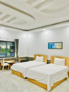 Phòng 2 Giường Đơn Nhìn Ra Hồ Bơi (Twin Room with Pool View)