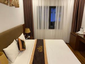 Phòng Tiêu Chuẩn Giường Đôi Lớn (Standard Queen Room)