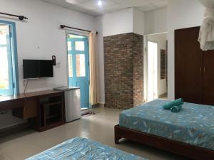 Phòng 4 người nhìn ra vườn (Quadruple Room with Garden View)