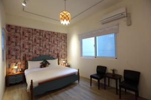 Phòng Tiêu Chuẩn Giường Đôi Lớn (Standard Queen Room)