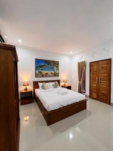 Phòng Deluxe Giường Đôi Với Ban Công và Tầm Nhìn Ra Biển (Deluxe Double Room with Balcony and Sea View)