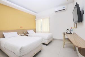 Phòng Deluxe Giường Đôi/2 Giường Đơn (Deluxe Double or Twin Room)
