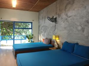 Phòng Deluxe Giường Đôi/2 Giường Đơn Nhìn Ra Vườn (Deluxe Double or Twin Room with Garden View)
