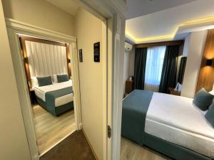 Family Connecting Room for 4 Pax room in Hotel Black Tulip