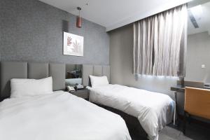 Phòng Phổ thông 2 giường đơn Không hút thuốc (Economy Twin Room - Non-Smoking)
