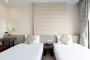 Phòng Hai Giường Đơn Loại Sang (Deluxe Twin Room)