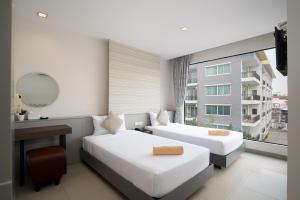 Phòng Hai Giường Đơn Loại Sang (Deluxe Twin Room)