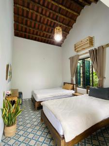 Phòng 2 Giường Đơn Nhìn Ra Khu Vườn (Twin Room with Garden View)