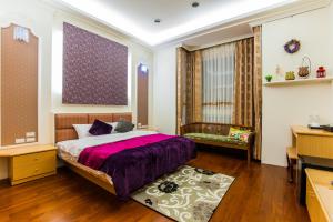 Phòng Deluxe Giường Đôi Có Vòi Sen (Deluxe Double Room with Shower)