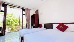 Phòng cho 3 người có Ban Công (Triple Room with Balcony)