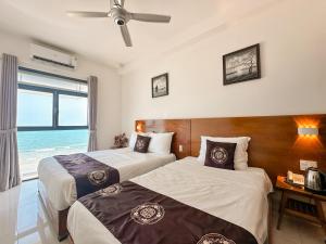 Deluxe giường ba Hướng biển (Deluxe Triple Sea View)