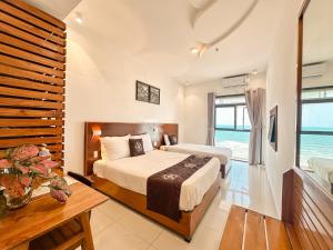 Deluxe giường ba Hướng biển (Deluxe Triple Sea View)