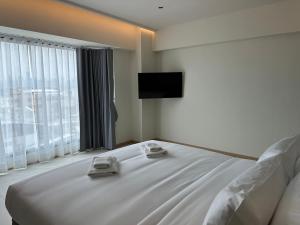 Phòng Lớn Sang Trọng (Deluxe Large Room)