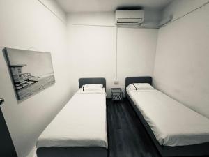 K2 Guesthouse Central Phòng 2 Giường Đơn Hạng Bình Dân (Budget Twin Room)