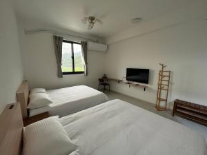 Phòng Tiêu Chuẩn 2 Giường Đơn Nhìn Ra Khu Vườn (Standard Twin Room with Garden View)