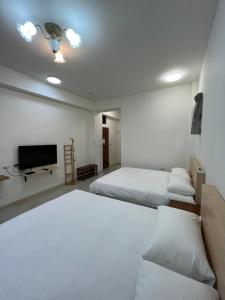 Phòng 4 người nhìn ra vườn (Quadruple Room with Garden View)
