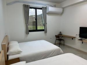 Phòng 4 người nhìn ra vườn (Quadruple Room with Garden View)