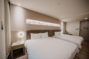 Phòng Business 4 người không có cửa sổ (Business Quadruple Room without Window)
