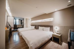 Phòng Deluxe 4 người (Deluxe Quadrale Room)