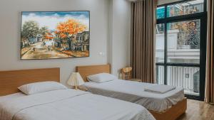 Phòng Hai Giường Đơn Loại Sang (Deluxe Twin Room)