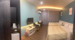 Phòng Deluxe 4 Người (Deluxe Quadruple Room)