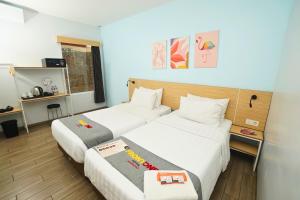 Phòng Hai Giường Đơn Loại Sang (Deluxe Twin Room)