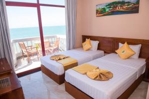 Phòng Deluxe Giường Đôi/2 Giường Đơn Nhìn Ra Biển (Deluxe Double or Twin Room with Sea View)