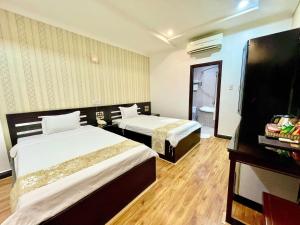 Phòng Hai Giường Đơn Loại Sang (Deluxe Twin Room)