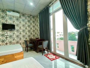 Phòng 4 Người Có Ban Công (Quadruple Room with Balcony)