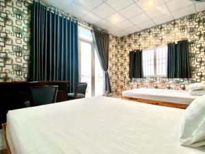 Phòng 4 Người Có Ban Công (Quadruple Room with Balcony)