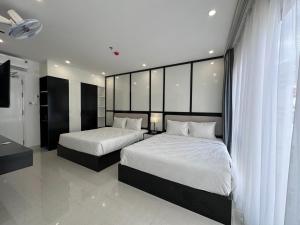 Phòng Deluxe Có 2 Giường Cỡ Queen (Deluxe Queen Room with Two Queen Beds)