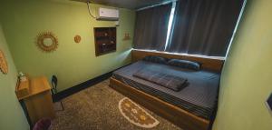 Phòng 3 người với Phòng tắm Chung (Triple Room with Shared Bathroom)