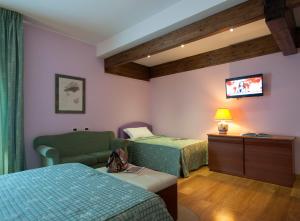 Triple Room room in La Pergola Roma Hotel