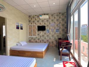 Phòng 4 Người Có Ban Công (Quadruple Room with Balcony)
