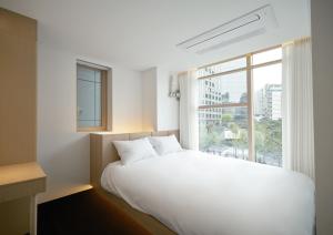 Phòng Ấm Cúng Hướng Thành Phố 2 Giường Đơn (Cozy City View Twin Room)