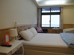 Phòng Deluxe Giường Đôi Nhìn Ra Biển Từ Phía Bên Cạnh (Deluxe Double Room with Side Sea View)