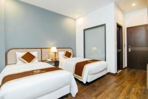 Phòng Hai Giường Đơn Loại Sang (Deluxe Twin Room)