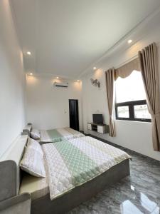 Phòng Tiêu Chuẩn Có 2 Giường Cỡ Queen (Standard Queen Room with Two Queen Beds)