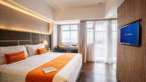 Phòng Deluxe Giường Đôi Có Ban Công (Deluxe Double Room with Balcony)