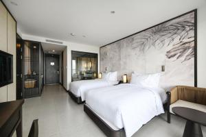 Phòng Hai Giường Đơn Loại Sang (Deluxe Twin Room)