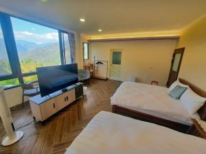 Phòng 4 người Nhìn ra cảnh Núi non (Quadruple Room with Mountain View)
