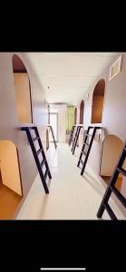 Giường Đơn Trong Phòng Ngủ Tập Thể Nữ (Single Bed in Female Dormitory Room)