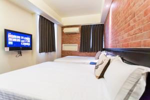 Phòng Tiêu chuẩn 4 người (Standard Quadruple Room)