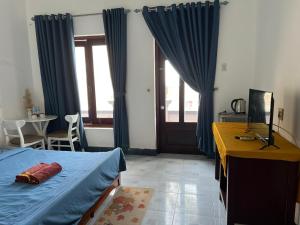 Phòng Deluxe Giường Đôi Với Ban Công và Tầm Nhìn Ra Biển (Deluxe Double Room with Balcony and Sea View)