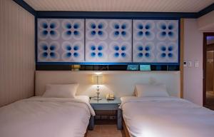 Phòng Hai Giường Đơn Loại Sang (Deluxe Twin Room)