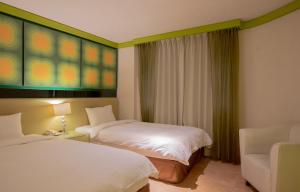 Phòng Hai Giường Đơn Loại Sang (Deluxe Twin Room)